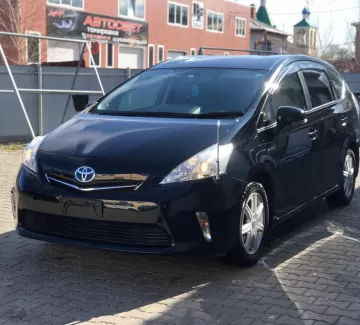 Купить Toyota Prius Alpha 1800 см3 АКПП (99 л.с.) Гибридный бензиновый в Краснодар: цвет черный Универсал 2014 года по цене 980000 рублей, объявление №21057 на сайте Авторынок23