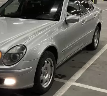 Купить Mercedes-Benz E-class 3200 см3 АКПП (224 л.с.) Дизель турбонаддув в Коржевский: цвет Серебрянный Седан 2004 года по цене 450000 рублей, объявление №25210 на сайте Авторынок23