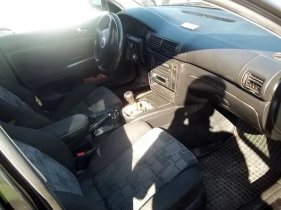 Купить Volkswagen Passat В5 1600 см3 МКПП (101 л.с.) Бензин инжектор в Кропоткин: цвет черный Универсал 1998 года по цене 230000 рублей, объявление №5148 на сайте Авторынок23