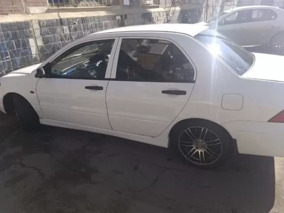 Купить Mitsubishi Lancer Cedia 1800 см3 АКПП (130 л.с.) Бензин инжектор в Кирпильская: цвет Белый Седан 2002 года по цене 347000 рублей, объявление №21292 на сайте Авторынок23