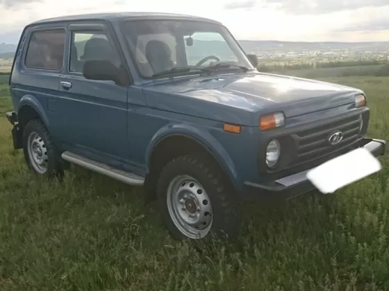 Купить ВАЗ (LADA) Нива 1700 см3 МКПП (79 л.с.) Бензин карбюратор в Отрадная : цвет Синий Универсал 1999 года по цене 165000 рублей, объявление №22161 на сайте Авторынок23