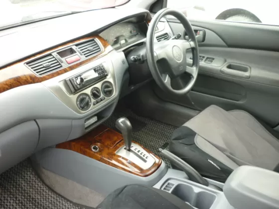 Купить Mitsubishi Lancer 1500 см3 АКПП (102 л.с.) Бензин инжектор в Новроссийск: цвет Белый Седан 2003 года по цене 245000 рублей, объявление №198 на сайте Авторынок23