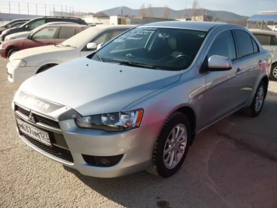 Купить Mitsubishi Lancer X 1500 см3 АКПП (109 л.с.) Бензиновый в Новороссийск: цвет Серебряный Седан 2010 года по цене 495000 рублей, объявление №679 на сайте Авторынок23