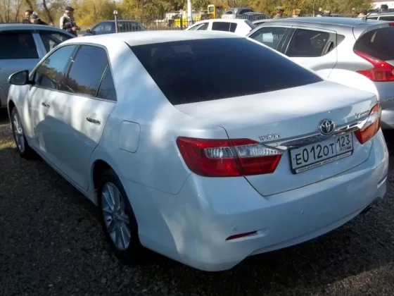 Купить Toyota Camry 2500 см3 МКПП (182 л.с.) Бензин инжектор в Кропоткин: цвет белый перламутр Седан 2014 года по цене 1100000 рублей, объявление №5275 на сайте Авторынок23