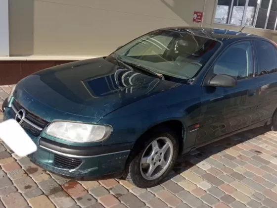 Купить Opel Omega 2000 см3 МКПП (136 л.с.) Бензин инжектор в Ладожская : цвет Зелёный Седан 1995 года по цене 335000 рублей, объявление №22014 на сайте Авторынок23