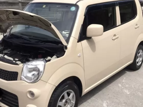Купить Nissan Moco 700 см3 CVT (52 л.с.) Бензин инжектор в Геленджик: цвет Бежевый Хетчбэк 2014 года по цене 595000 рублей, объявление №22444 на сайте Авторынок23