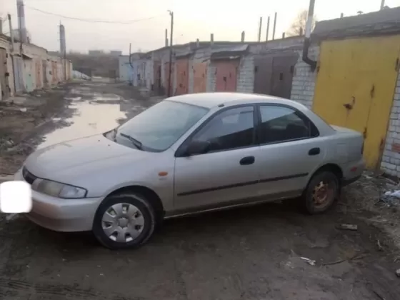 Купить Mazda 323 1500 см3 МКПП (90 л.с.) Бензин инжектор в Двубратский: цвет Бежевый Седан 1997 года по цене 155000 рублей, объявление №22013 на сайте Авторынок23