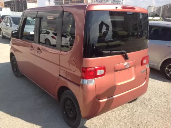 Купить Daihatsu Tanto 700 см3 АКПП (58 л.с.) Бензин инжектор в Геленджик: цвет оранжевый Хетчбэк 2009 года по цене 305000 рублей, объявление №1699 на сайте Авторынок23