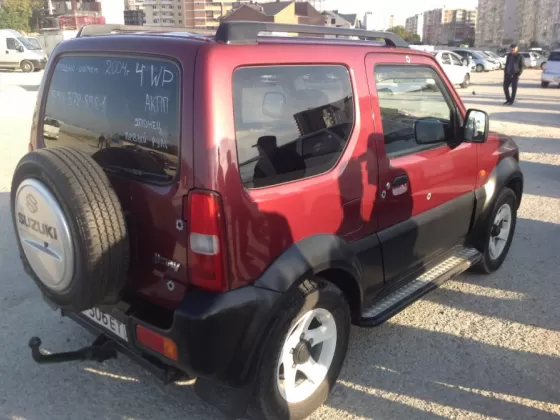 Купить Suzuki Jimny 1300 см3 АКПП (85 л.с.) Бензин инжектор в Новороссийск: цвет вишня Внедорожник 2004 года по цене 345000 рублей, объявление №2327 на сайте Авторынок23