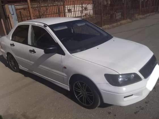 Купить Mitsubishi Lancer Cedia 1800 см3 АКПП (130 л.с.) Бензин инжектор в Кирпильская: цвет Белый Седан 2002 года по цене 347000 рублей, объявление №21292 на сайте Авторынок23