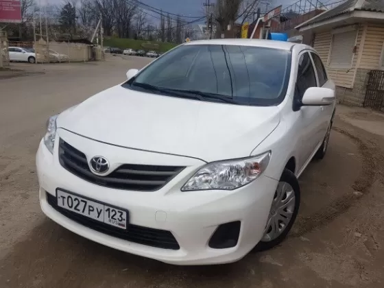 Купить Toyota Corolla, 1600 см3 АКПП (124 л.с.) Бензин инжектор в Краснодар: цвет белый Седан 2013 года по цене 285000 рублей, объявление №14344 на сайте Авторынок23