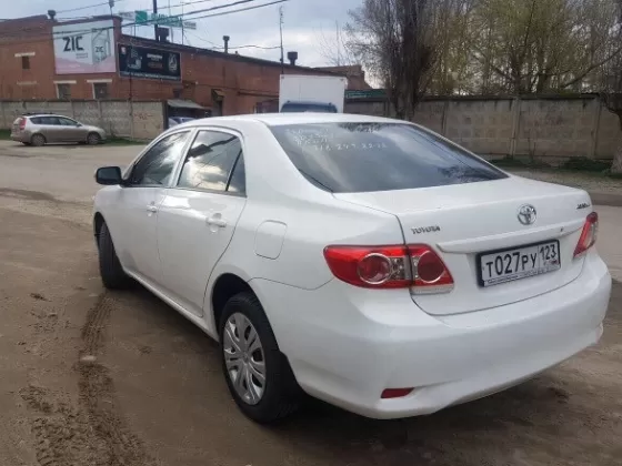 Купить Toyota Corolla, 1600 см3 АКПП (124 л.с.) Бензин инжектор в Краснодар: цвет белый Седан 2013 года по цене 285000 рублей, объявление №14344 на сайте Авторынок23