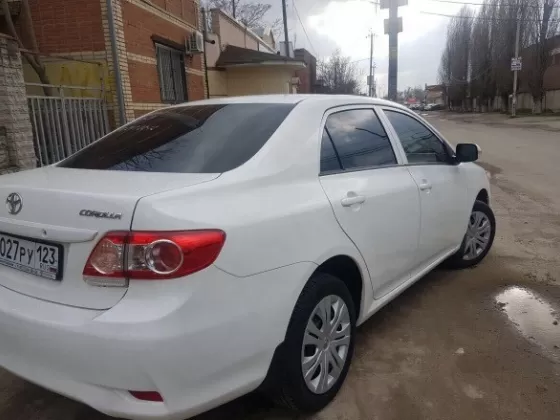 Купить Toyota Corolla, 1600 см3 АКПП (124 л.с.) Бензин инжектор в Краснодар: цвет белый Седан 2013 года по цене 285000 рублей, объявление №14344 на сайте Авторынок23