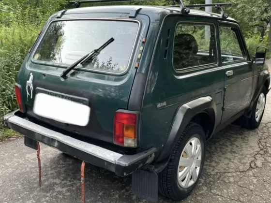 Купить ВАЗ (LADA) Нива 1700 см3 МКПП (79 л.с.) Бензин карбюратор в Раздольная : цвет Зелёный Универсал 1999 года по цене 175000 рублей, объявление №22219 на сайте Авторынок23