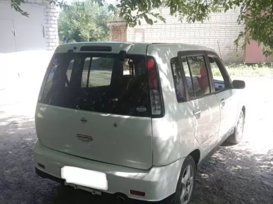 Купить Nissan Cube 1300 см3 CVT (85 л.с.) Бензин инжектор в Краснодар: цвет Белый Хетчбэк 2000 года по цене 488000 рублей, объявление №25258 на сайте Авторынок23