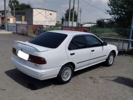 Купить Nissan Sunny 1500 см3 АКПП (105 л.с.) Бензин инжектор в Новотиторовская: цвет Белый Седан 1999 года по цене 340000 рублей, объявление №25599 на сайте Авторынок23