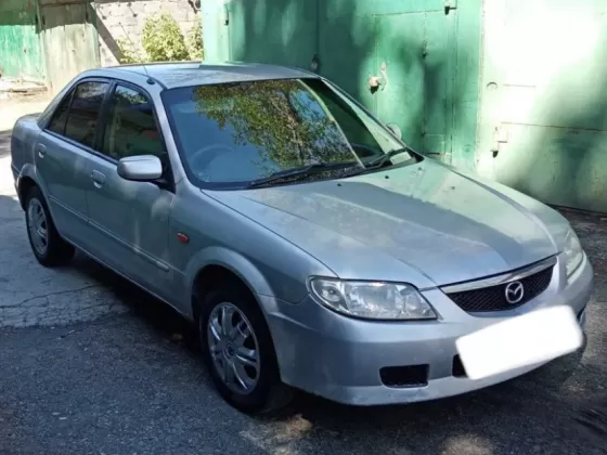 Купить Mazda Familia 1300 см3 АКПП (85 л.с.) Бензин инжектор в Нововеличковская: цвет Серый Седан 1999 года по цене 235000 рублей, объявление №21960 на сайте Авторынок23