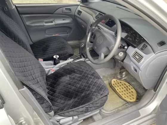 Купить Mitsubishi Lancer Cedia 1800 см3 АКПП (130 л.с.) Бензин инжектор в Брюховецкая: цвет Серебряный Седан 2002 года по цене 350000 рублей, объявление №21302 на сайте Авторынок23
