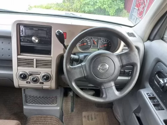 Купить Nissan Cube 1400 см3 АКПП (98 л.с.) Бензин инжектор в Журавская: цвет Белый Хетчбэк 2003 года по цене 553000 рублей, объявление №22280 на сайте Авторынок23