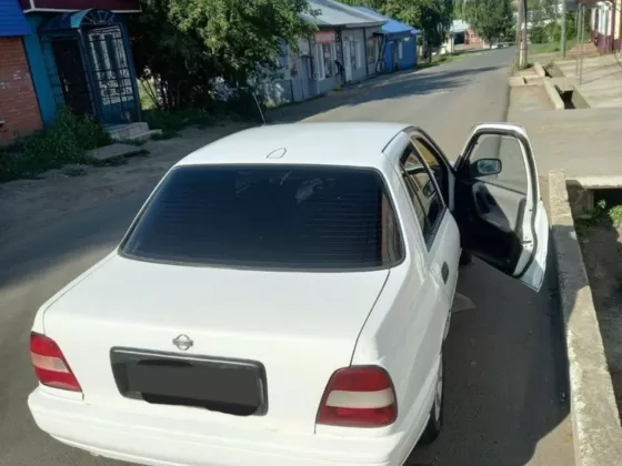 Купить Nissan Sanni '1995 МКПП (1400/102 л.с.) Бензин карбюратор Армавир цвет Белый Седан по цене 325000 рублей, объявление №27477 на сайте Авторынок23