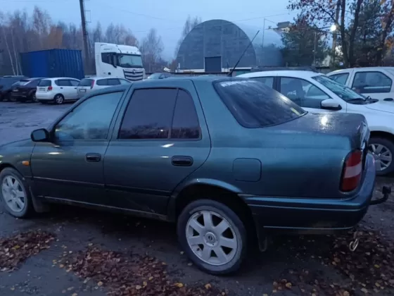 Купить Nissan Санни '1995 МКПП (1400/110 л.с.) Бензин карбюратор Новороссийск цвет Зеленый Седан по цене 325000 рублей, объявление №27478 на сайте Авторынок23