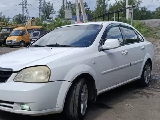 Купить Chevrolet Klan '2011 МКПП (1400/109 л.с.) Бензин инжектор Ейск цвет Белый Седан по цене 245500 рублей, объявление №27441 на сайте Авторынок23