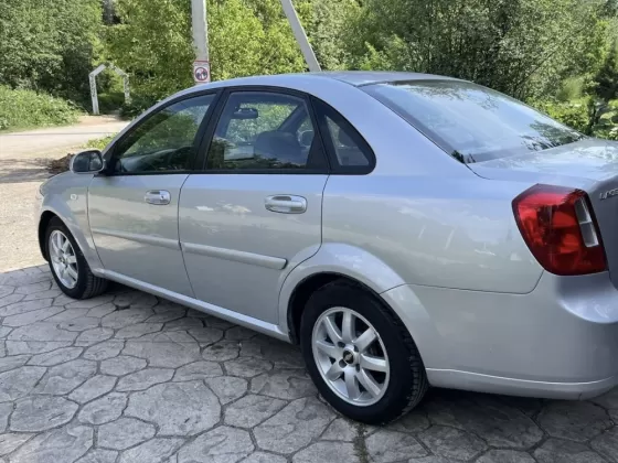 Купить Chevrolet Klan '2011 МКПП (1400/109 л.с.) Бензин инжектор Марьянская цвет Серебристый Седан по цене 250000 рублей, объявление №27447 на сайте Авторынок23