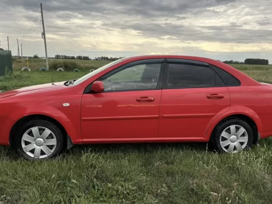 Купить Chevrolet Klan '2011 МКПП (1400/109 л.с.) Бензин инжектор Петровская цвет Красный Седан по цене 260000 рублей, объявление №27443 на сайте Авторынок23