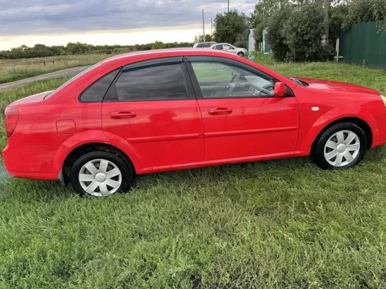 Купить Chevrolet Klan '2011 МКПП (1400/109 л.с.) Бензин инжектор Петровская цвет Красный Седан по цене 260000 рублей, объявление №27443 на сайте Авторынок23