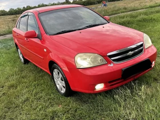 Купить Chevrolet Klan '2011 МКПП (1400/109 л.с.) Бензин инжектор Петровская цвет Красный Седан по цене 260000 рублей, объявление №27443 на сайте Авторынок23