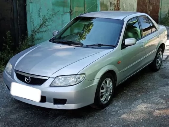 Купить Mazda Familia 1300 см3 АКПП (85 л.с.) Бензин инжектор в Нововеличковская: цвет Серый Седан 1999 года по цене 235000 рублей, объявление №21960 на сайте Авторынок23