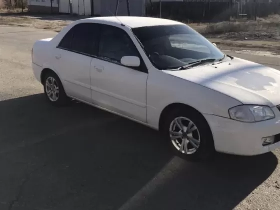 Купить Mazda Familia 1400 см3 АКПП (85 л.с.) Бензин инжектор в Небуг: цвет Белый Седан 1999 года по цене 210000 рублей, объявление №20921 на сайте Авторынок23