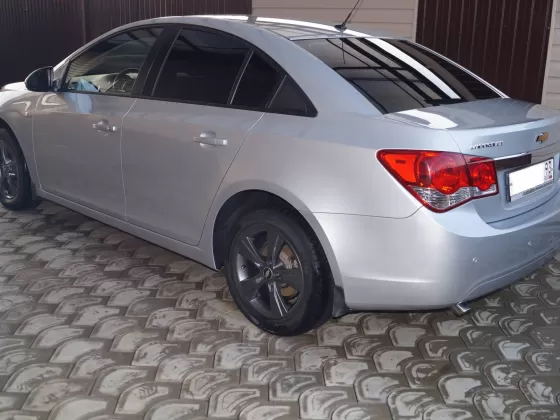 Купить Chevrolet Cruze '2012 АКПП (1800/141 л.с.) Бензин инжектор Ленинградская цвет серебристый металлик Седан по цене 539000 рублей, объявление №9628 на сайте Авторынок23