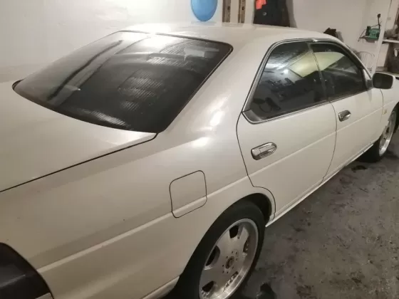 Купить Nissan Laurel '1999 АКПП (2000/130 л.с.) Бензин инжектор Темрюк цвет Белый Седан по цене 550000 рублей, объявление №21386 на сайте Авторынок23
