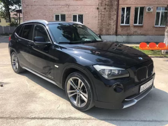 Купить BMW X1 '2009 АКПП (280/258 л.с.) Бензин инжектор Крымск цвет черный Кроссовер по цене 690000 рублей, объявление №18747 на сайте Авторынок23