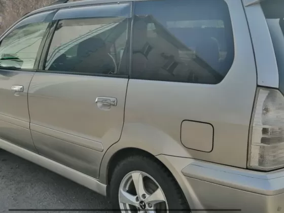 Купить Mitsubishi Grandis Chariot 2350 см3 АКПП (165 л.с.) Бензин инжектор в Курганинск: цвет Песочный Универсал 1998 года по цене 530000 рублей, объявление №21665 на сайте Авторынок23