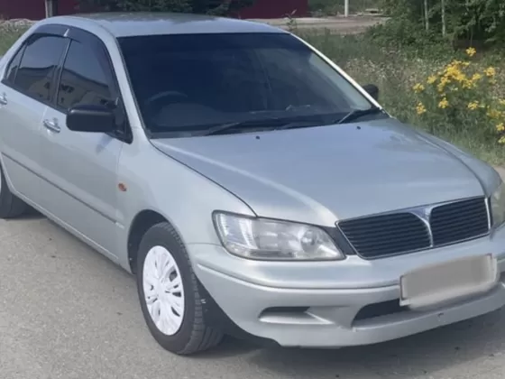 Купить Mitsubishi Lancer Cedia 1500 см3 АКПП (130 л.с.) Бензин инжектор в Октябрьский: цвет Серый Хетчбэк 2002 года по цене 340000 рублей, объявление №22315 на сайте Авторынок23