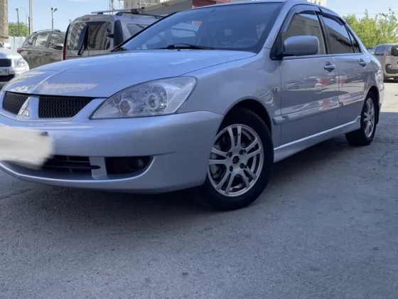 Купить Mitsubishi Lancer '2007 АКПП (1600/98 л.с.) Бензин карбюратор Крымск цвет Серебристый Седан по цене 500000 рублей, объявление №22077 на сайте Авторынок23