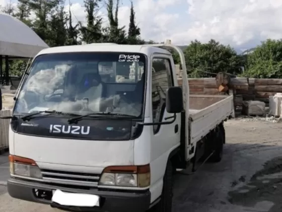 Купить Isuzu Elf 4200 см3 МКПП (134 л.с.) Дизельный в Апшеронск: цвет Белый Самосвал 2002 года по цене 579000 рублей, объявление №25686 на сайте Авторынок23