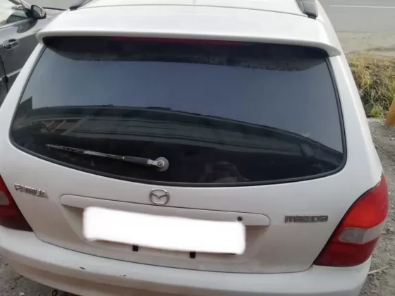 Купить Mazda Familia 1500 см3 АКПП (110 л.с.) Бензин инжектор в Агой: цвет Белый Универсал 2000 года по цене 225000 рублей, объявление №20081 на сайте Авторынок23