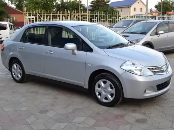 Купить Nissan Tiida 1500 см3 АКПП (109 л.с.) Бензин инжектор в Краснодар: цвет серебристый Седан 2010 года по цене 426000 рублей, объявление №1389 на сайте Авторынок23