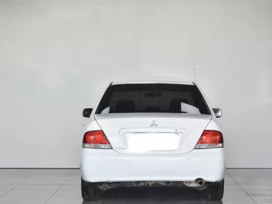 Купить Mitsubishi Lancer 1500 см3 АКПП (114 л.с.) Бензин инжектор в Новороссийск : цвет Белый Седан 2003 года по цене 290000 рублей, объявление №25038 на сайте Авторынок23