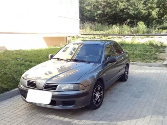 Купить Mitsubishi Carisma 1600 см3 МКПП (103 л.с.) Бензин инжектор в Тамань : цвет Серый Седан 2003 года по цене 212000 рублей, объявление №23185 на сайте Авторынок23