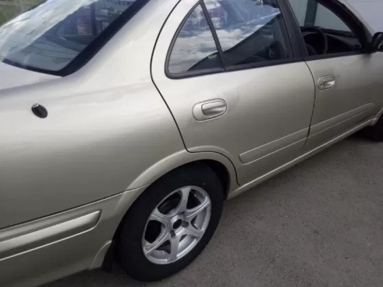 Купить Nissan Sunny 1500 см3 АКПП (105 л.с.) Бензин инжектор в Павловская : цвет Золотой Седан 2002 года по цене 245000 рублей, объявление №22493 на сайте Авторынок23