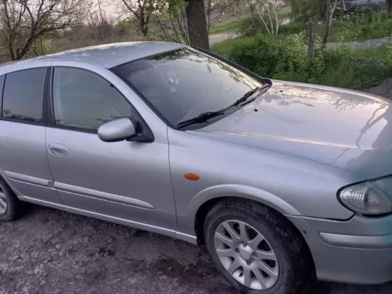 Купить Nissan Almera 1498 см3 МКПП (90 л.с.) Бензин карбюратор в Черноморский: цвет Серебристый Хетчбэк 2001 года по цене 199000 рублей, объявление №24819 на сайте Авторынок23