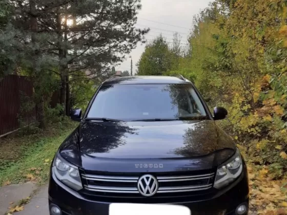 Купить Volkswagen Tiguan 2000 см3 АКПП (170 л.с.) Бензин инжектор в Анастасиевская: цвет Черный Универсал 2012 года по цене 215000 рублей, объявление №22748 на сайте Авторынок23