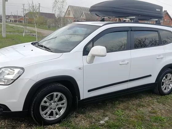 Купить Chevrolet Orlando 1796 см3 АКПП (141 л.с.) Бензин инжектор в Краснодар: цвет белый Минивэн 2012 года по цене 590000 рублей, объявление №19040 на сайте Авторынок23