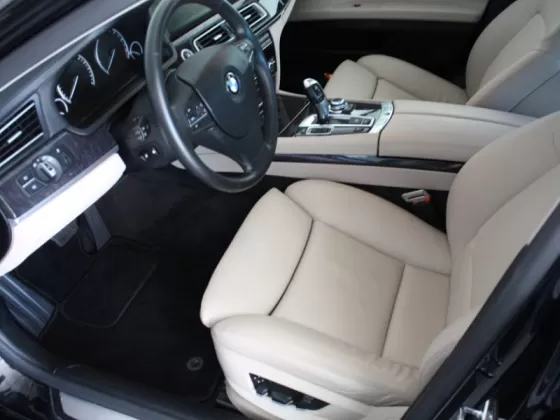 Купить BMW 7er 2979 см3 АКПП (326 л.с.) Бензин турбонаддув в Краснодар: цвет черный металик Седан 2008 года по цене 1300000 рублей, объявление №1480 на сайте Авторынок23