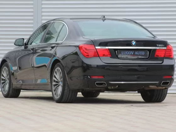 Купить BMW 750i (407Hp)хDrive 4400 см3 АКПП (407 л.с.) Бензин турбонаддув в Краснодар: цвет чёрный металлик Седан 2009 года по цене 1500000 рублей, объявление №1488 на сайте Авторынок23