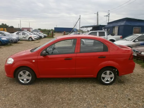 Купить Chevrolet Aveo 1400 см3 МКПП (101 л.с.) Бензин инжектор в ст. Воронежская: цвет красный Седан 2010 года по цене 335000 рублей, объявление №1597 на сайте Авторынок23